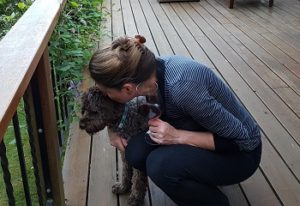 Rosana - Relaxing with pup after a day working in the garden.