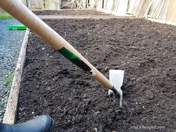 Tilling the soil (photo by My Garden Plot)